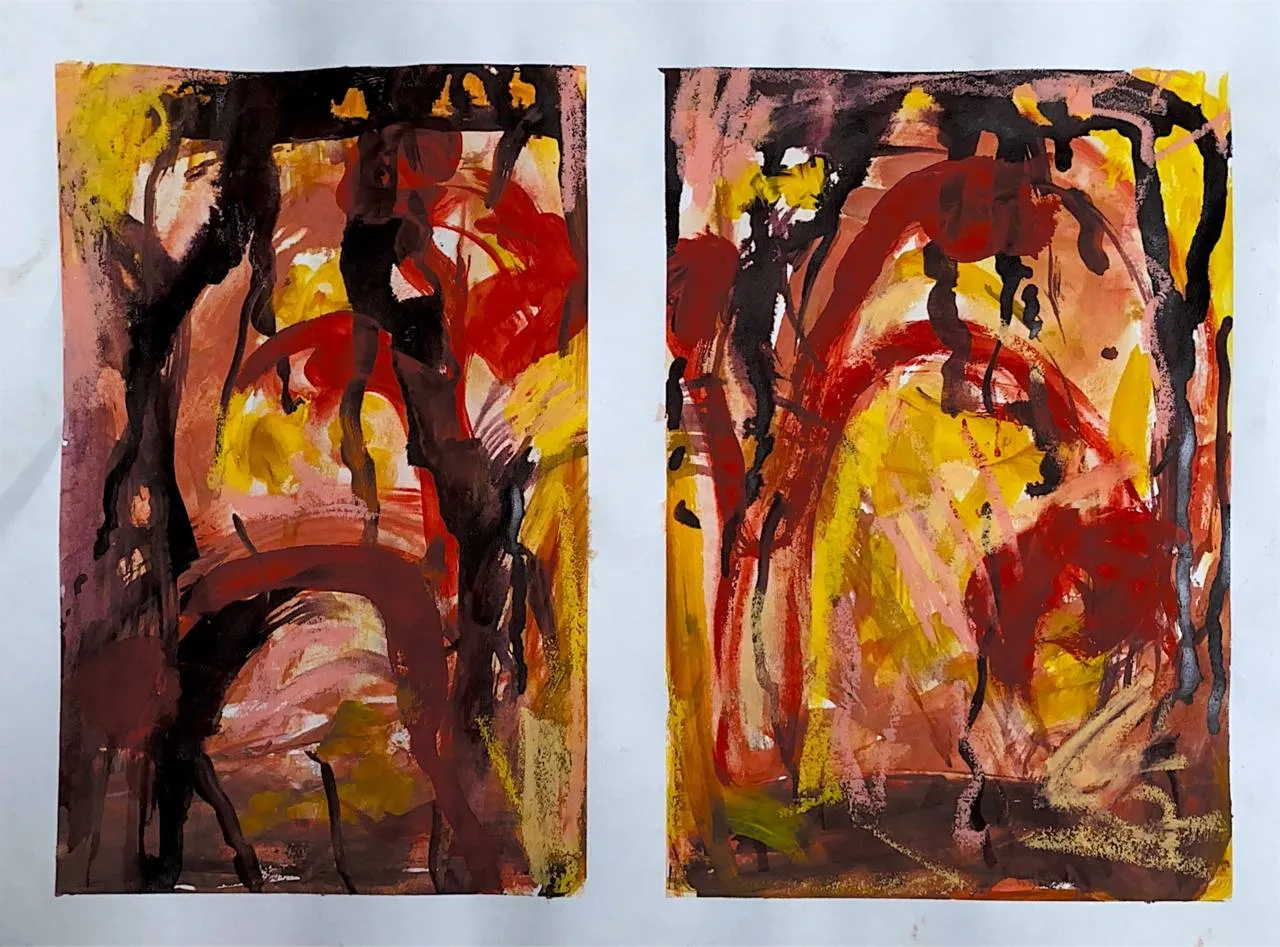 Warm red, yellow, and black abstract diptych on paper