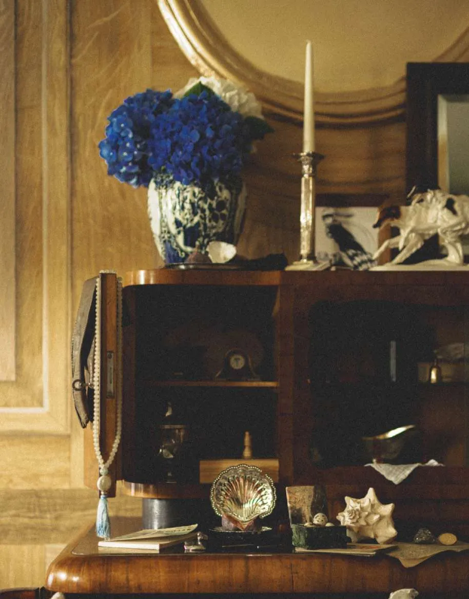 Shelf with vase and objects